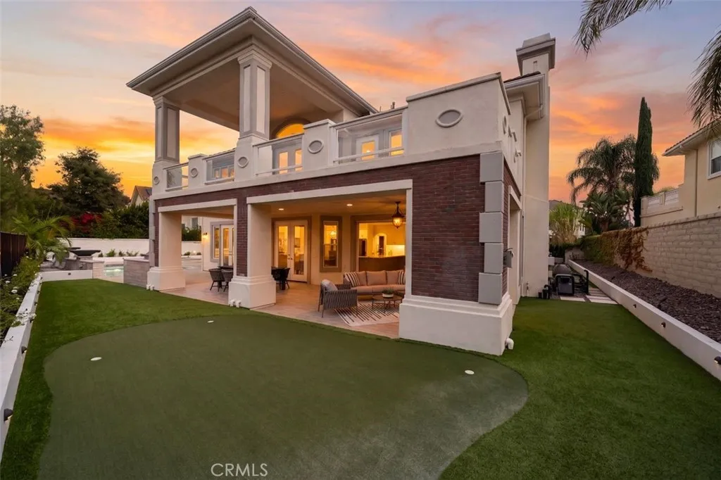 Backyard view of entertaining space.