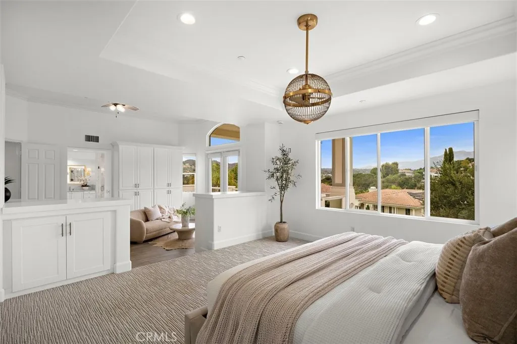 Custom cabinetry added throughout the bedroom.