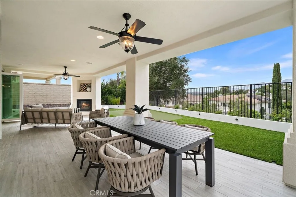 Dining Al-Fresco. Fireplace, ready for cozy nights.