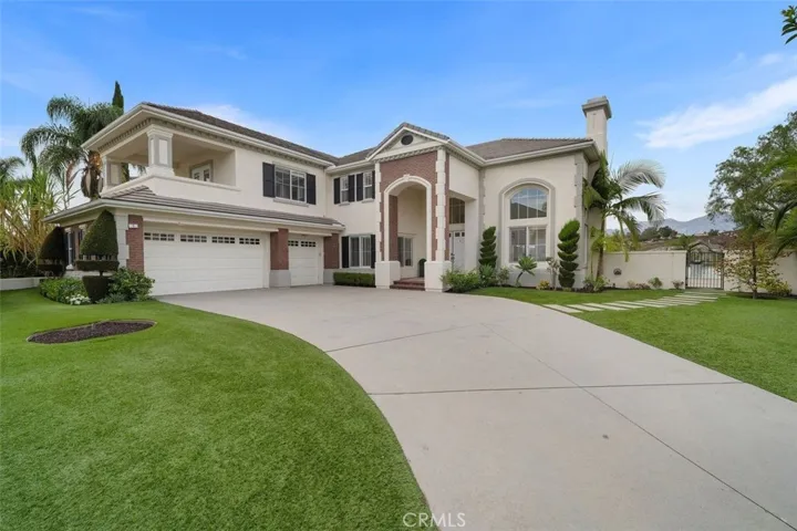 Three car garage with plenty of parking