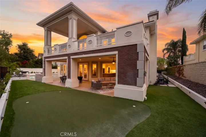 Backyard view of entertaining space.