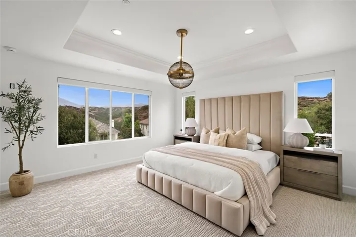 Lutron motorized shades. Peaceful views.