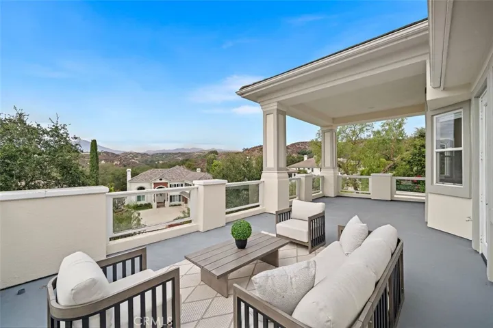 Private balcony off the primary.