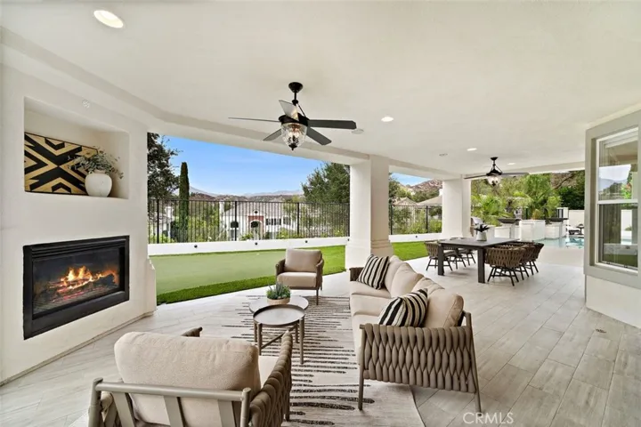 Putting greens for the golfer in the family.  Large covered space outdoor relaxing or entertaining.