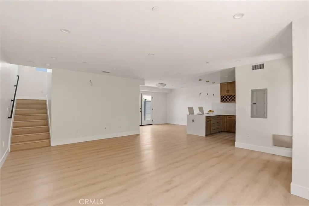 Unstaged living space from unit B