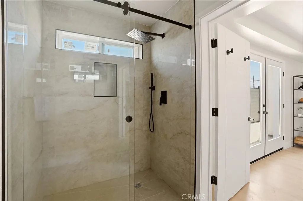 Walk in shower in downstairs bathroom, photo from Unit A (nearly identical unit)