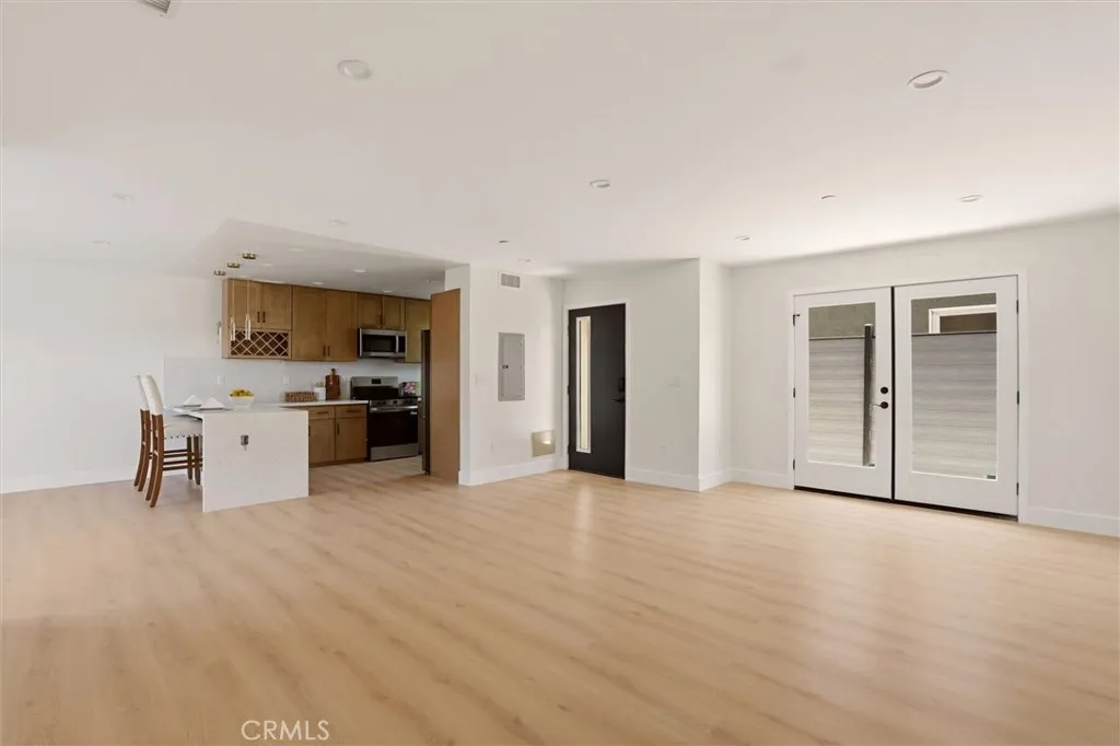 Unstaged living space from unit B