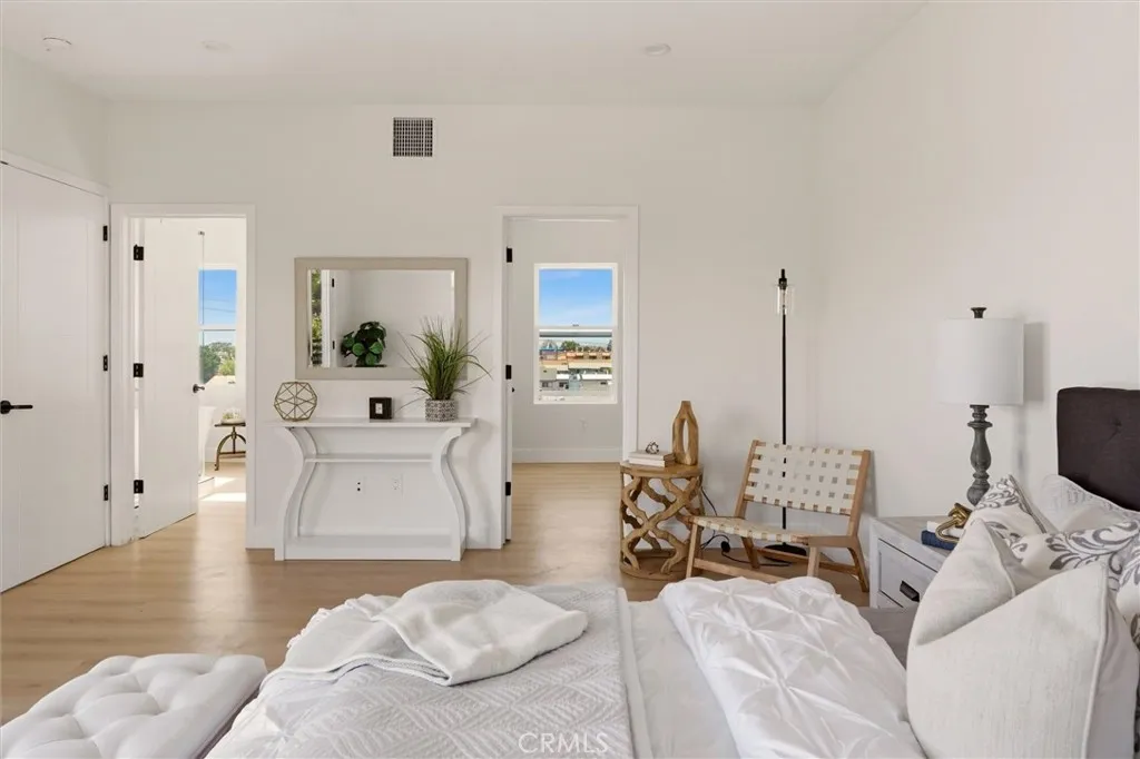 Spacious primary bedroom on 3rd floor, photo from Unit A (nearly identical unit)