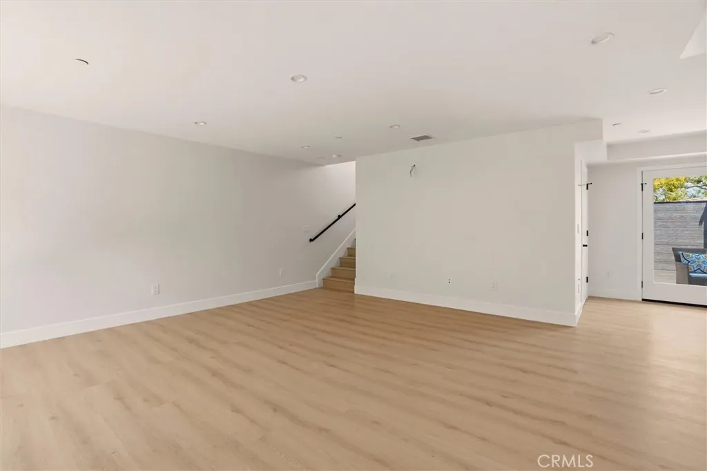 Unstaged living space from unit B