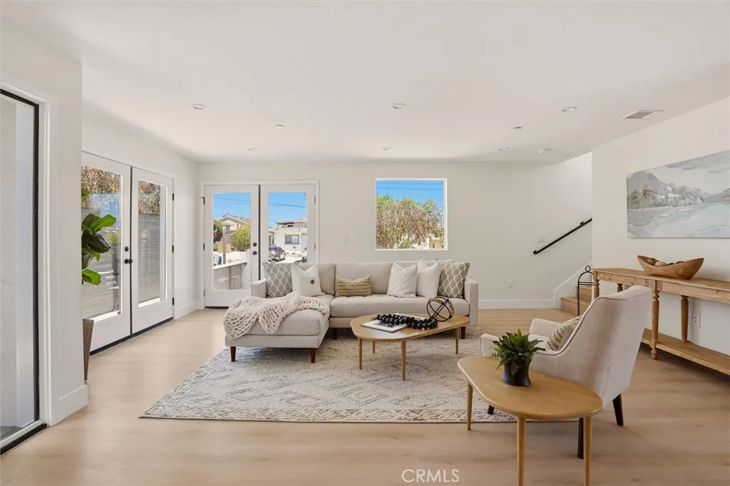 Staged main living area from Unit A (nearly identical unit)