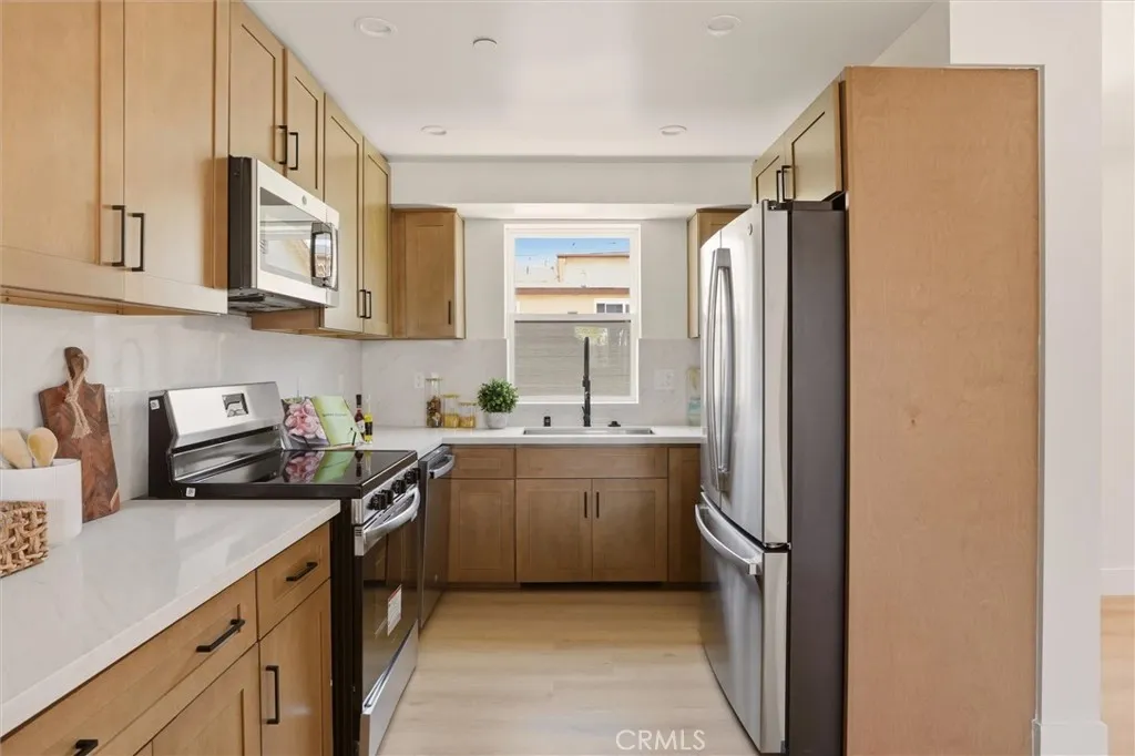 Modern kitchen and appliances in unit B