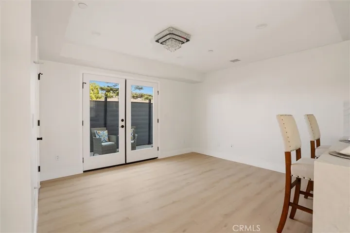 Unstaged dining area from unit B