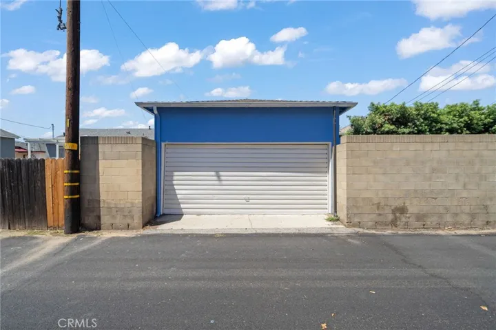 Garage entrance is from alley in the rear of property