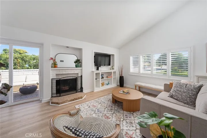 Living Room with built in & fireplace