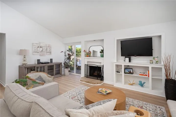Living Room with built in & fireplace