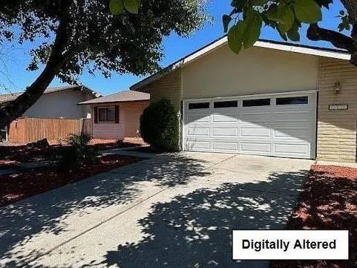 spacious & welcoming 4- bedroom home in Stockton!  Conveniently located near schools, and shopping.