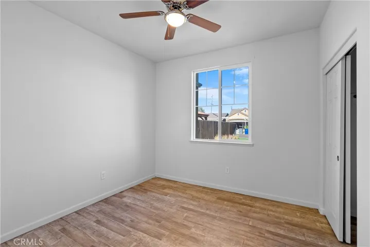 Hall bedroom 2 with ceiling fan