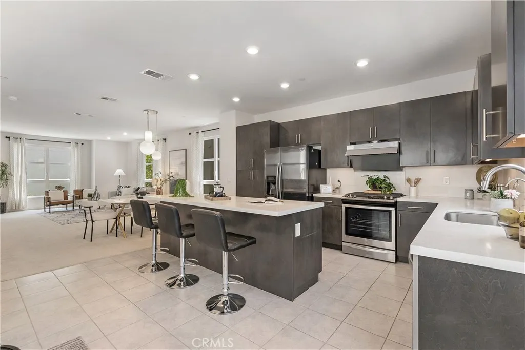 Kitchen and living room open floor plan - no shortage of seats or possibilities