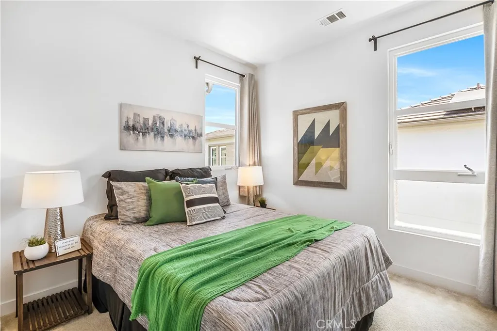 Bedroom 3 showcasing lots of natural light and high ceilings