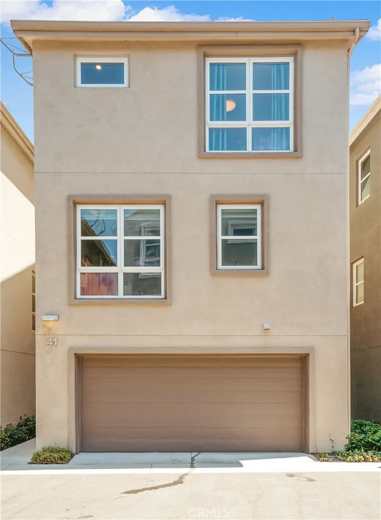Front view of home showing 2 car garage entrance