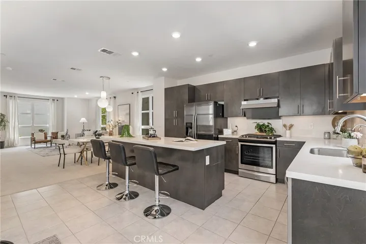 Kitchen and living room open floor plan - no shortage of seats or possibilities