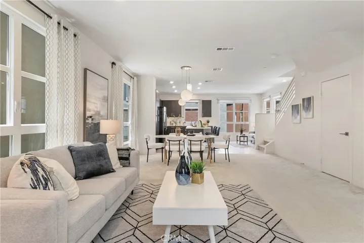 Additional photo -- Open living room - perfect for both entertaining and relaxing