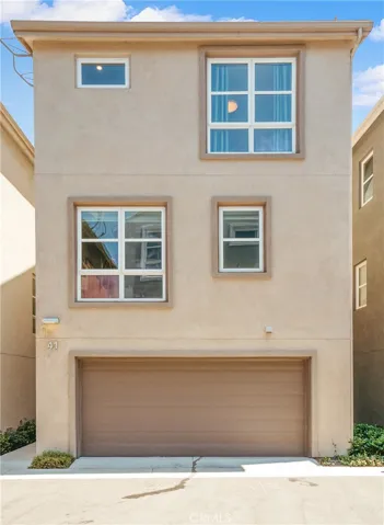 Front view of home showing 2 car garage entrance