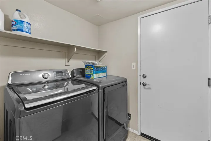 Main floor laundry room - digitally altered