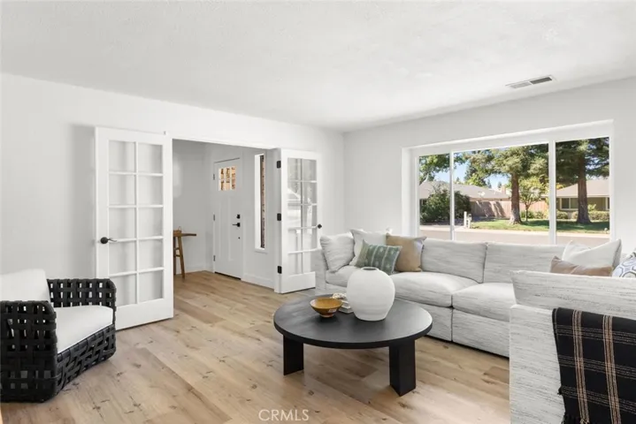 Fresh paint, lots of natural light flowing through the front family room.