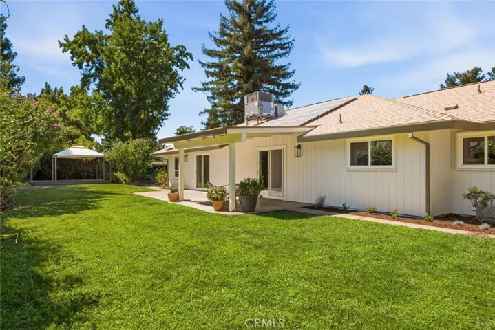 Large, expansive lawn with well-maintained green space and plenty of room for outdoor activities.