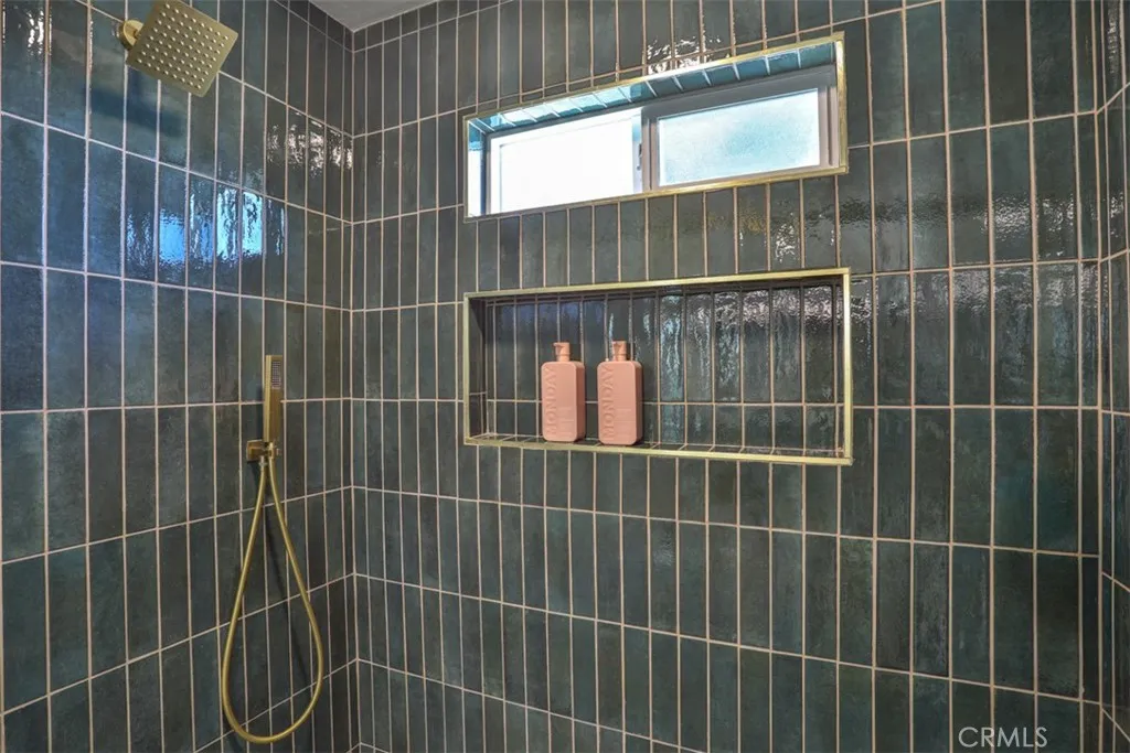 Upgraded step in shower with glass doors