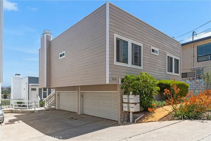 Two car garage on right.