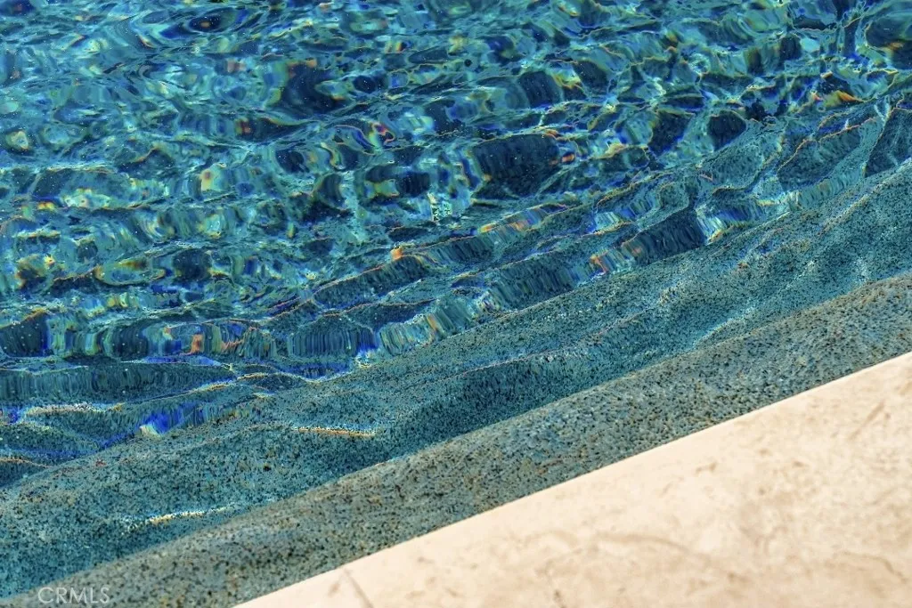 detail of pebbletech plaster