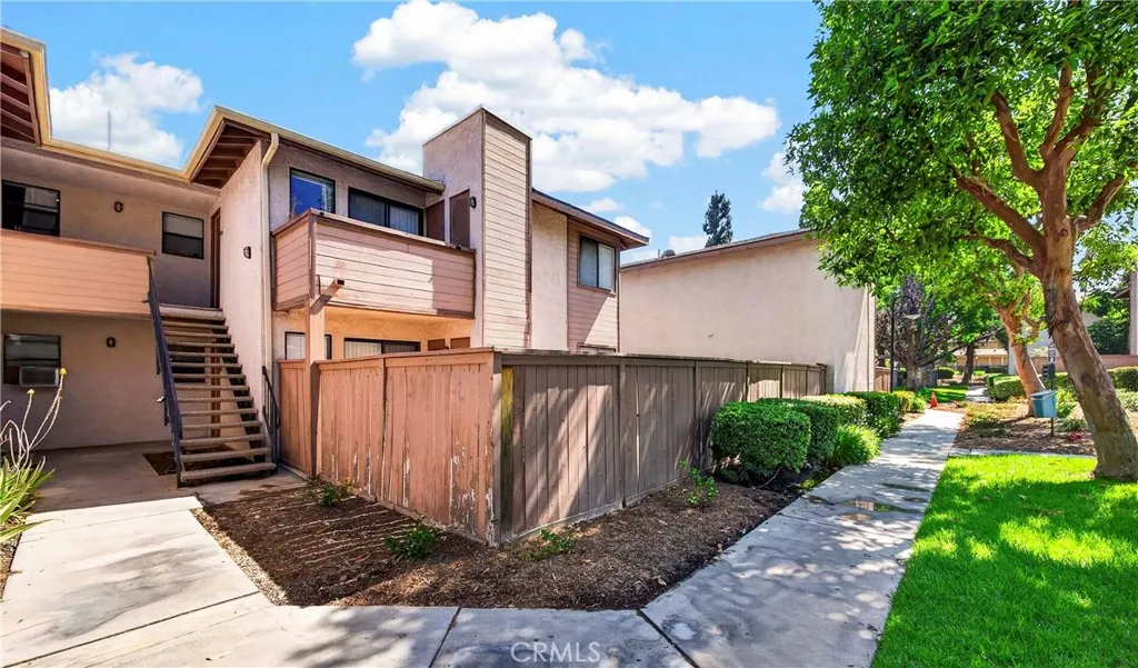 Desirable downstairs unit with good size paved yard.