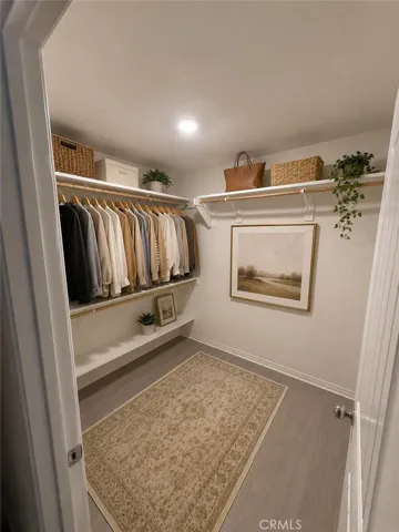 Digitally enhanced walk in closet for master bedroom
