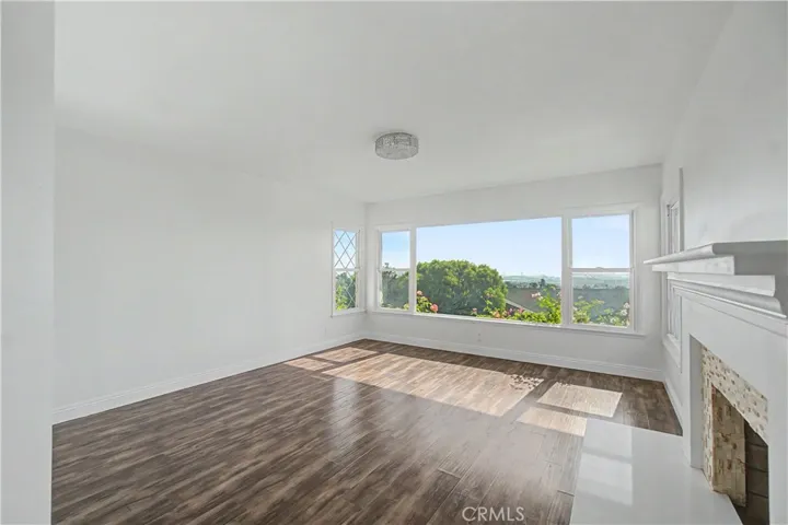 Living room with gas fireplace Harbor View