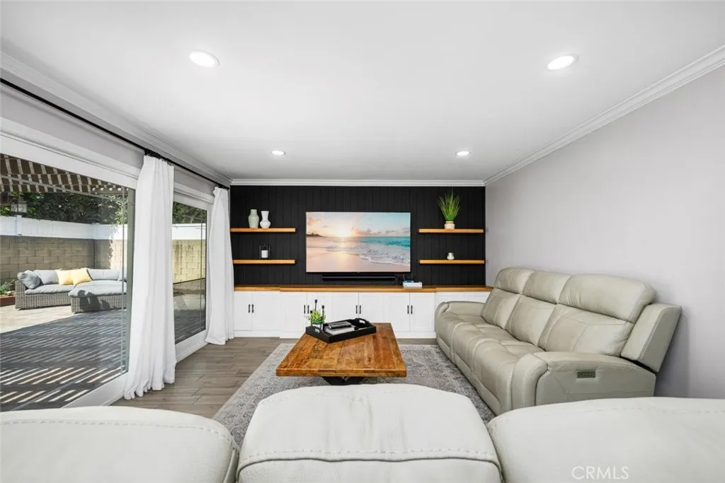 Adding style with built-in shelves and cabinets.