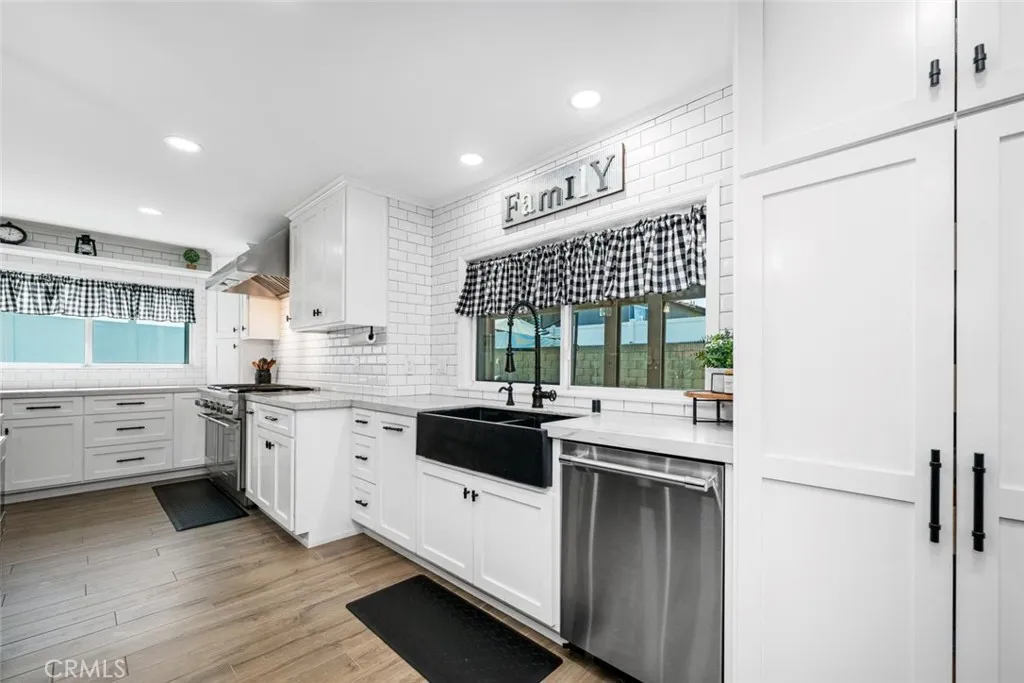 Farmhouse sink, Thermador dishwasher, and pantry.