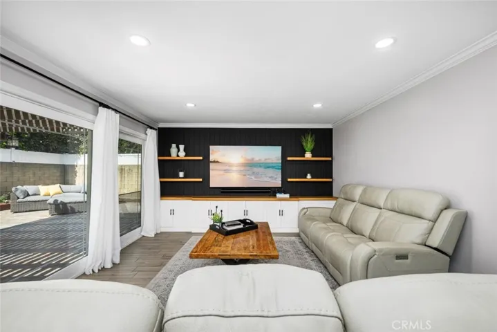 Adding style with built-in shelves and cabinets.