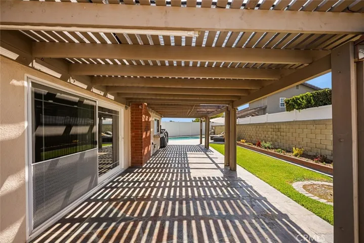 Large patio to entertain your guests for a summertime BBQ pool party.