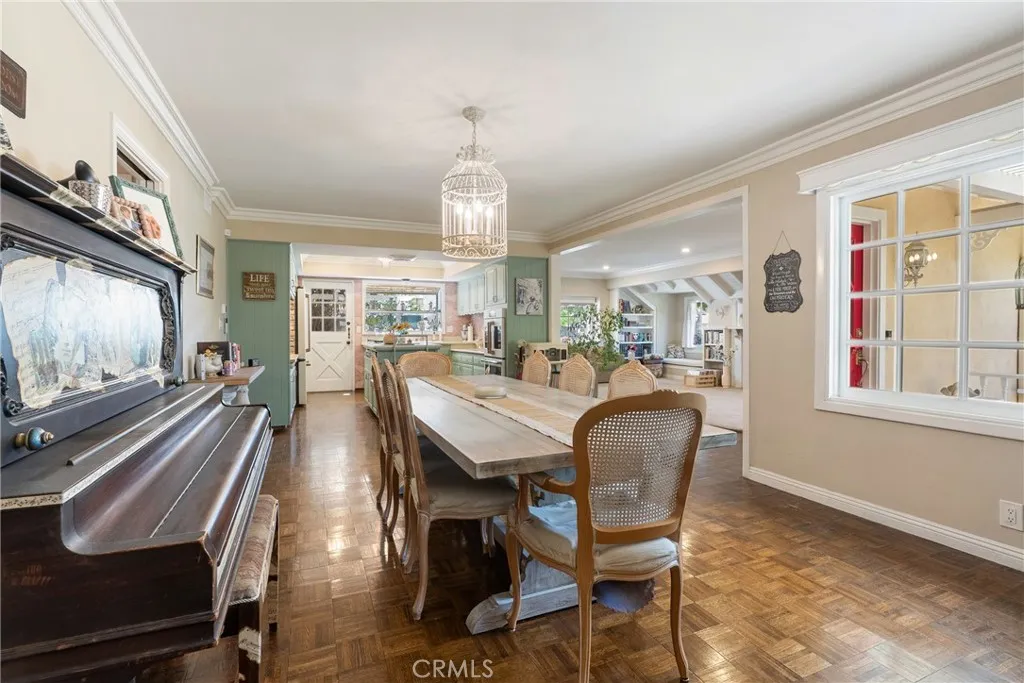 View from the end of the dining room toward the kitchen and living room.