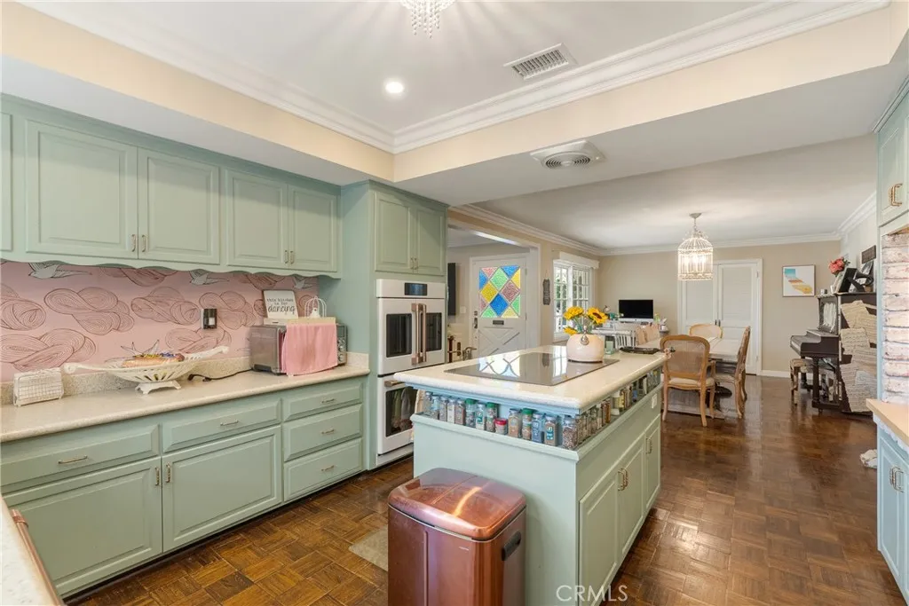 View of the pretty kitchen toward the dining room.
