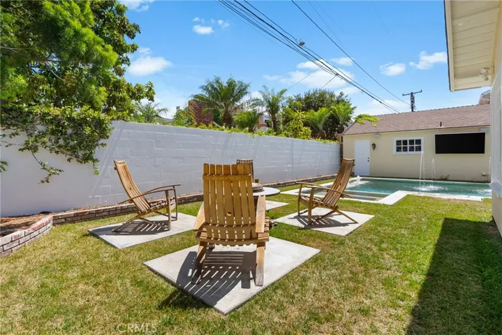 Fire pit and seating area for another gathering space.