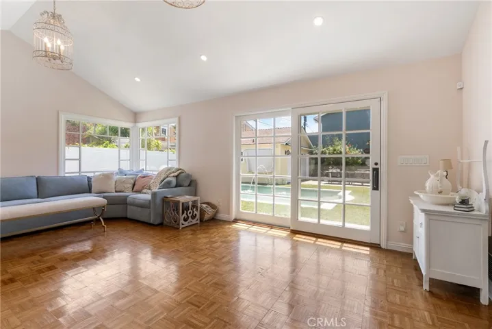 The family room has a huge slider overlooking the gorgeous backyard.
