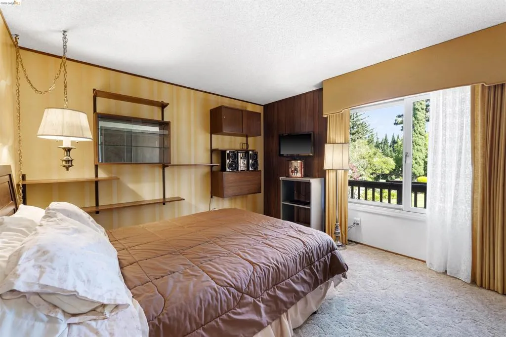 Sliding glass door opening to a private balcony
