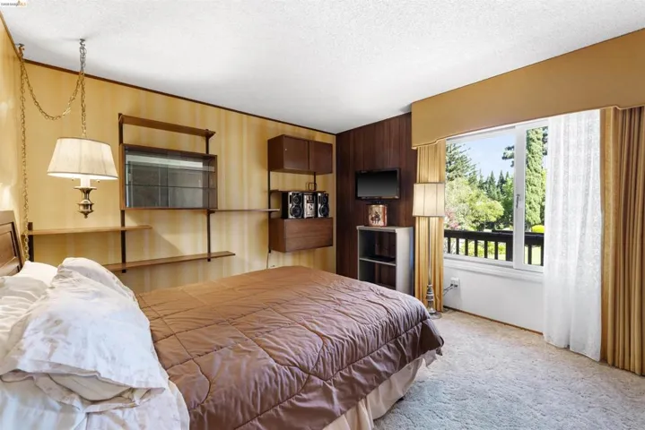 Sliding glass door opening to a private balcony