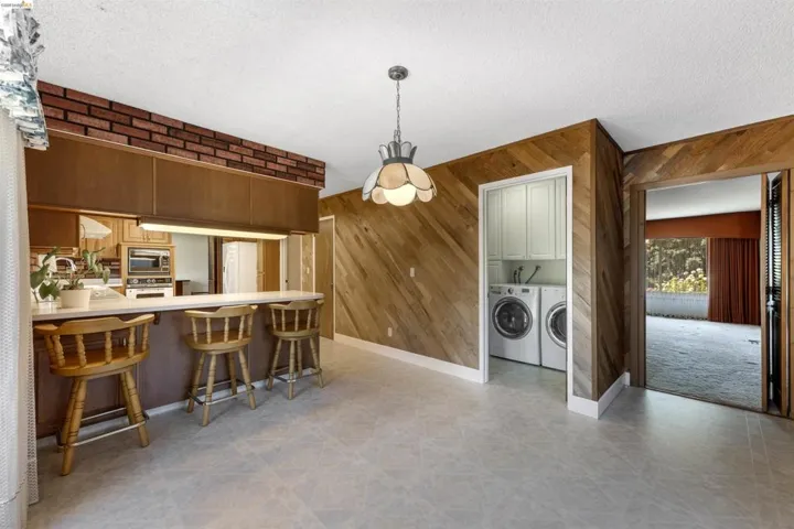 Breakfast bar with a light-toned countertop