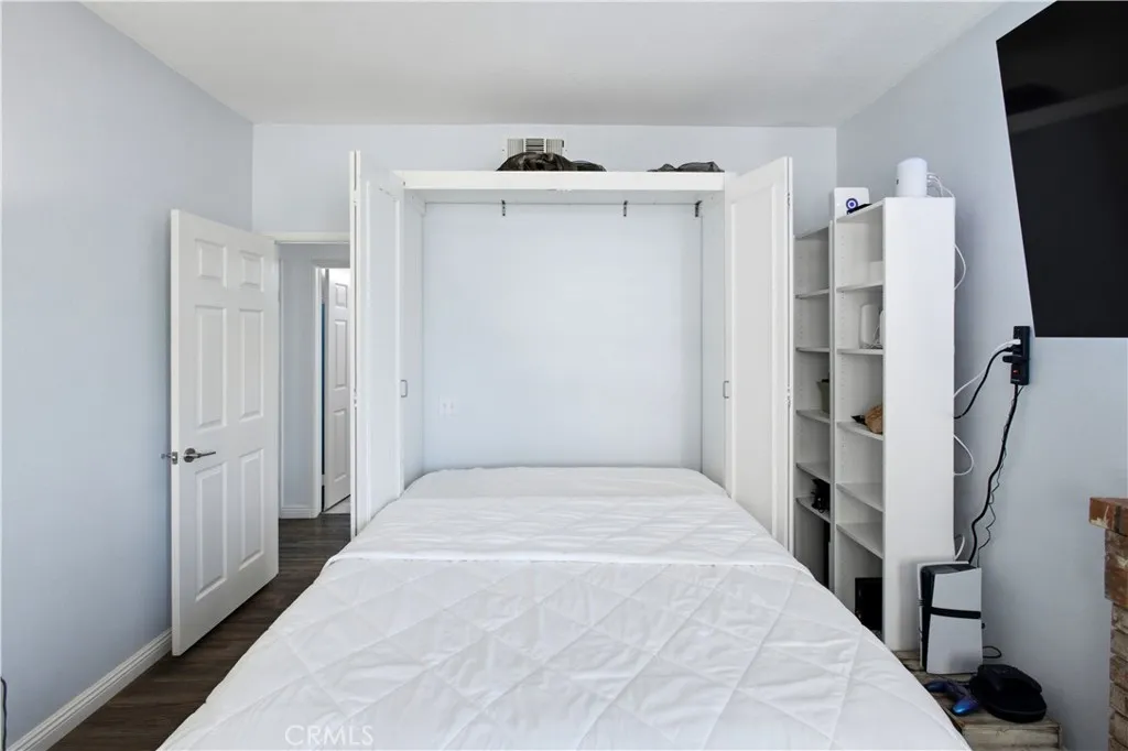 den showing with murphy bed option