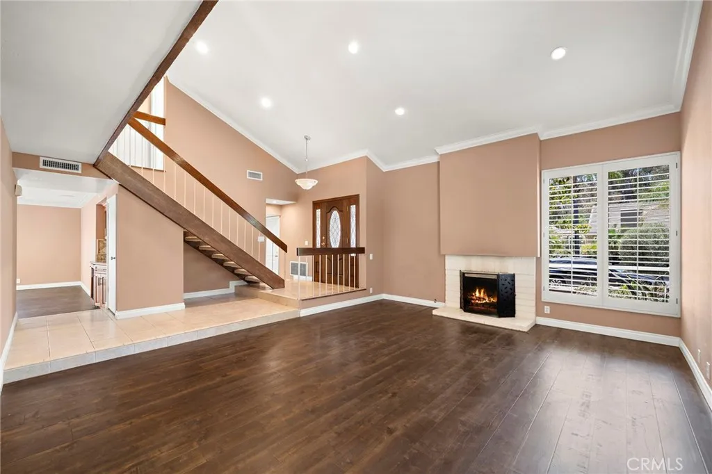 Vaulted ceilings welcome you into this exceptional home.