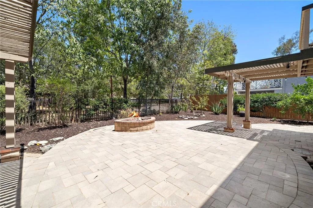 Privacy and reflection are perpetual while enjoying the fireside entertaining amidst a tranquil canopy of trees.